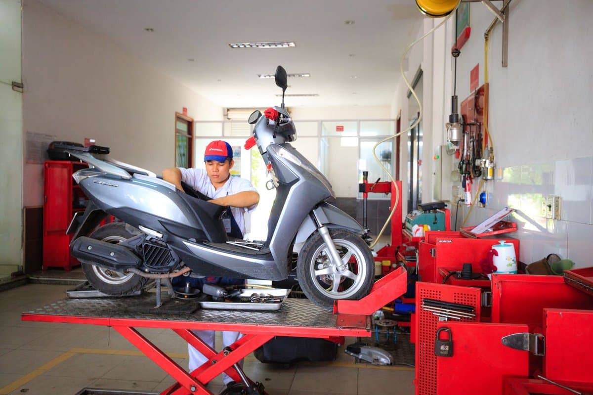 Electric scooter up on the service lift